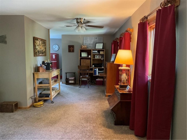 office area with carpet floors and ceiling fan