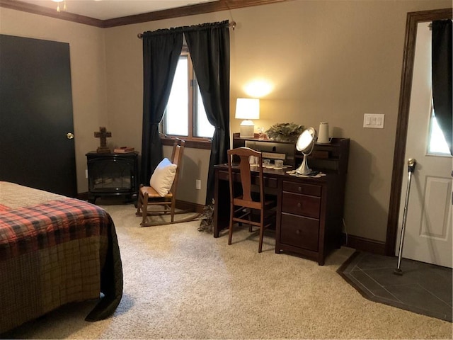 carpeted bedroom featuring crown molding and a wood stove