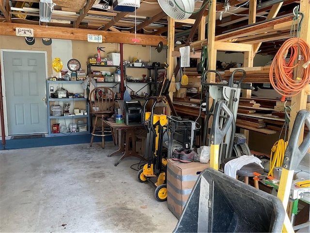 garage featuring a workshop area and a garage door opener