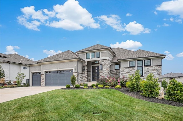 view of front of house with a front lawn and a garage