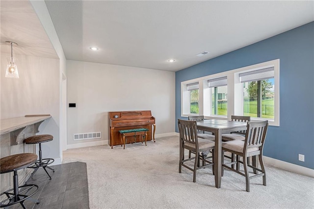 view of carpeted dining room