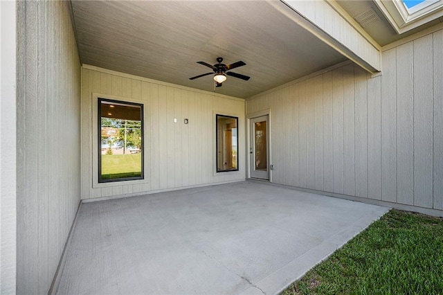 view of patio featuring ceiling fan