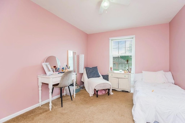 bedroom with ceiling fan and light colored carpet