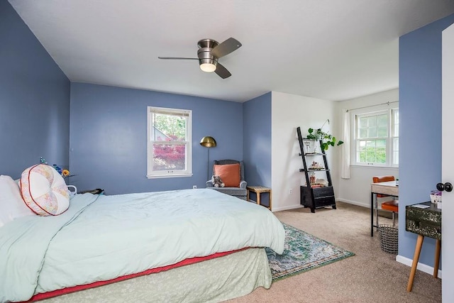 bedroom with ceiling fan and carpet