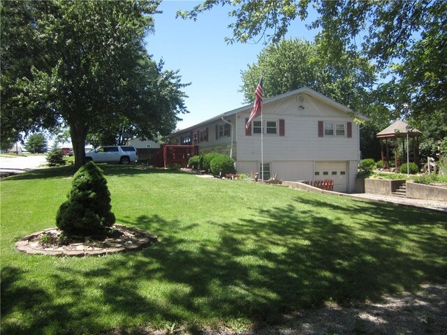 view of yard with a garage