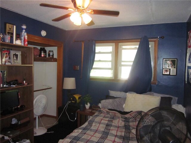 bedroom featuring ceiling fan