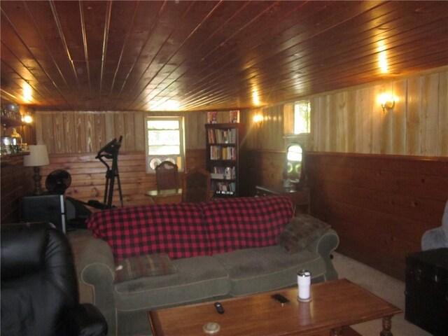 living room with wooden ceiling and wood walls