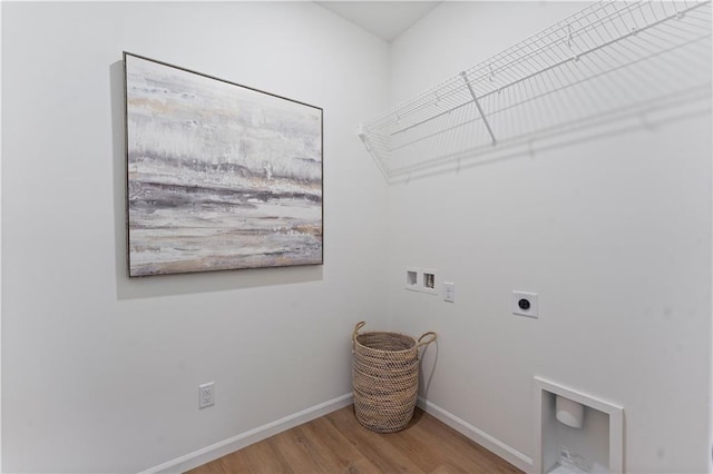 laundry room featuring hardwood / wood-style flooring, hookup for an electric dryer, and hookup for a washing machine