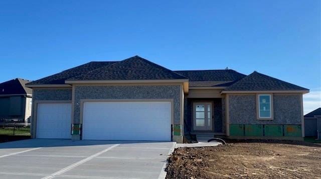 view of front of house with a garage