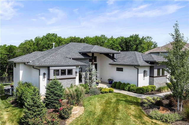 view of front of house with a front lawn