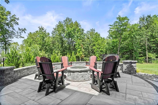 view of patio featuring a fire pit