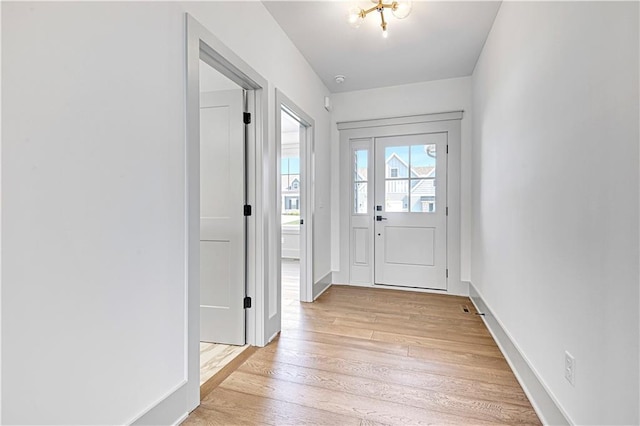 doorway featuring light hardwood / wood-style floors