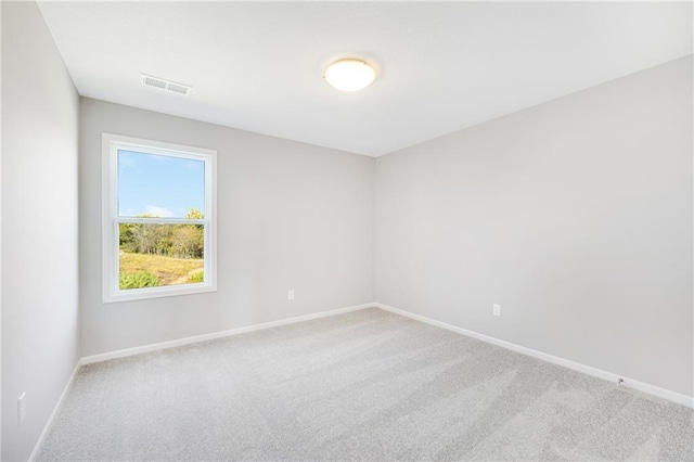 spare room with carpet flooring