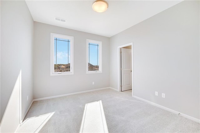 unfurnished bedroom with light carpet