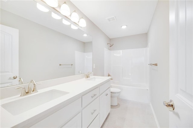 full bathroom with shower / bathing tub combination, vanity, toilet, and tile patterned flooring