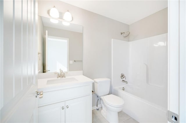 full bathroom featuring tile patterned floors, toilet, vanity, and shower / tub combination