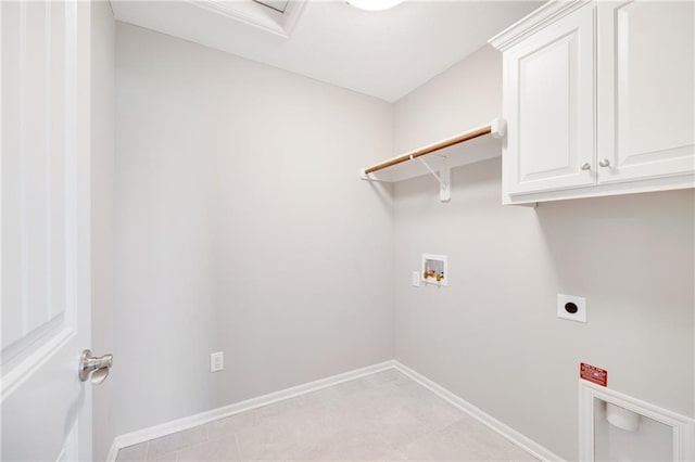 laundry area featuring cabinets, electric dryer hookup, and hookup for a washing machine