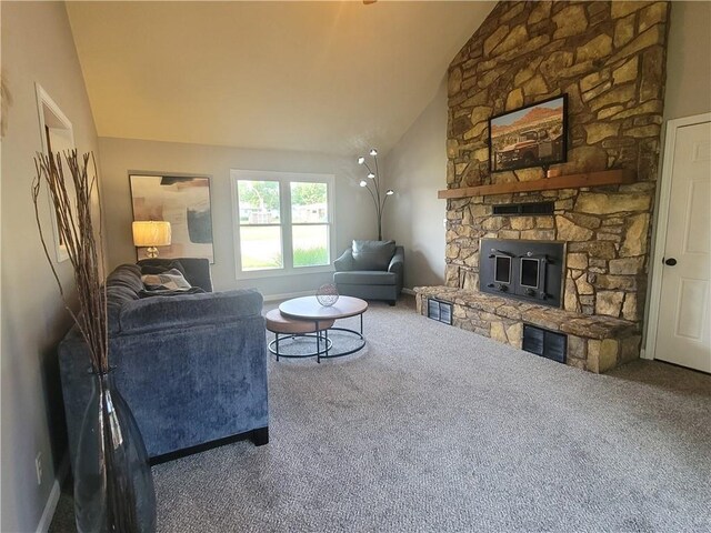 501 Meadow Ln, Fort Scott, KS 66701 - living room with a stone fireplace, carpet, and high vaulted ceiling