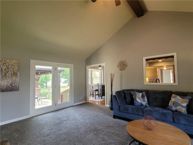 501 Meadow Ln, Fort Scott, KS 66701 - carpeted living room featuring beamed ceiling, ceiling fan, and high vaulted ceiling