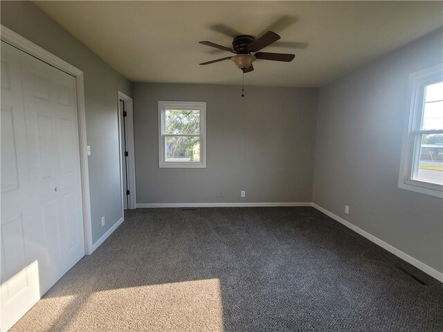 501 Meadow Ln, Fort Scott, KS 66701 - unfurnished room with ceiling fan, plenty of natural light, and carpet
