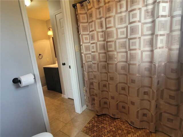 501 Meadow Ln, Fort Scott, KS 66701 - bathroom with vanity and tile patterned floors