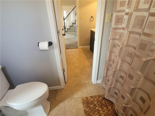 501 Meadow Ln, Fort Scott, KS 66701 - bathroom with tile patterned floors, toilet, and vanity