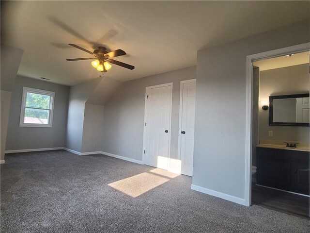 501 Meadow Ln, Fort Scott, KS 66701 - additional living space featuring sink, dark carpet, and ceiling fan