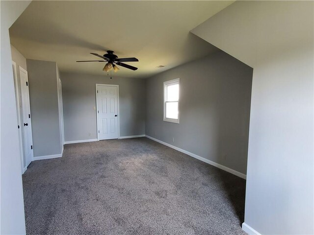 501 Meadow Ln, Fort Scott, KS 66701 - carpeted empty room with ceiling fan