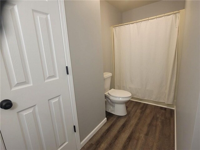 501 Meadow Ln, Fort Scott, KS 66701 - bathroom featuring hardwood / wood-style floors and toilet