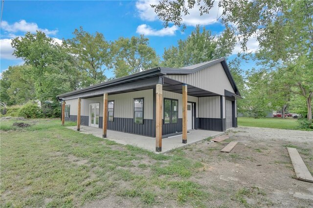 view of property exterior featuring a lawn