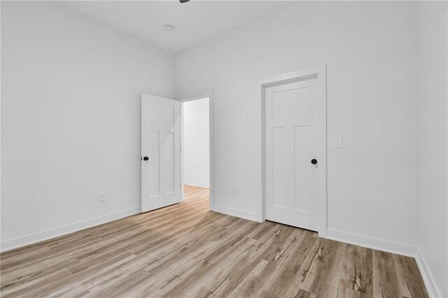 unfurnished bedroom featuring light hardwood / wood-style floors