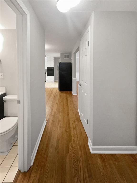 hall featuring light hardwood / wood-style floors