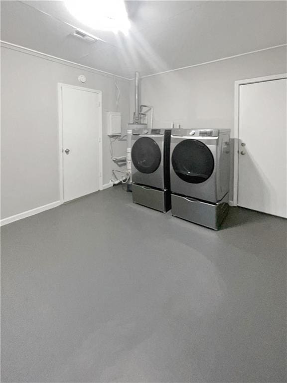 laundry room featuring independent washer and dryer