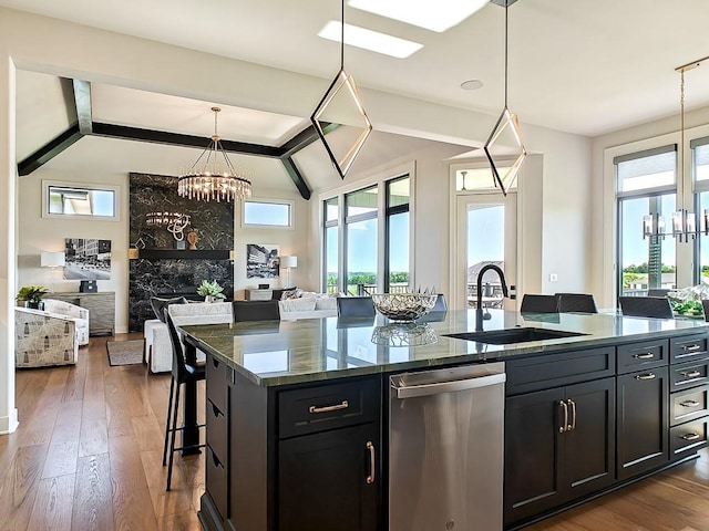 8013 Millridge St, Shawnee, KS 66220 - kitchen featuring a sink, lofted ceiling with beams, dishwasher, an inviting chandelier, and open floor plan