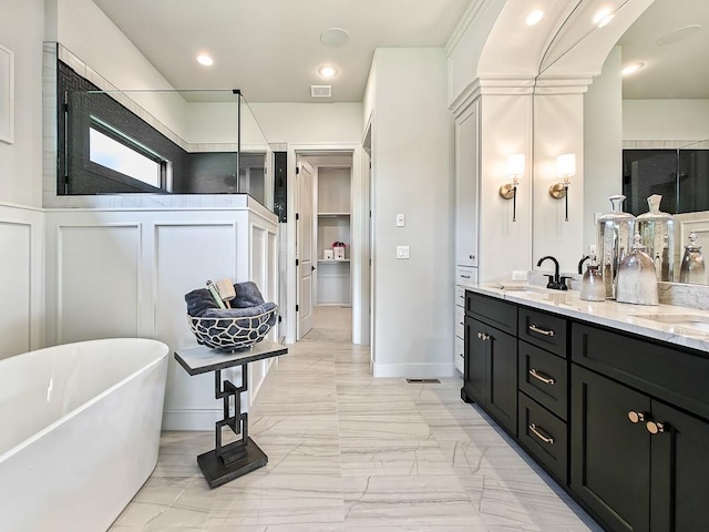 8013 Millridge St, Shawnee, KS 66220 - full bathroom with a sink, marble finish floor, visible vents, a soaking tub, and double vanity