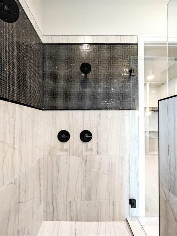 8013 Millridge St, Shawnee, KS 66220 - full bath with a tile shower