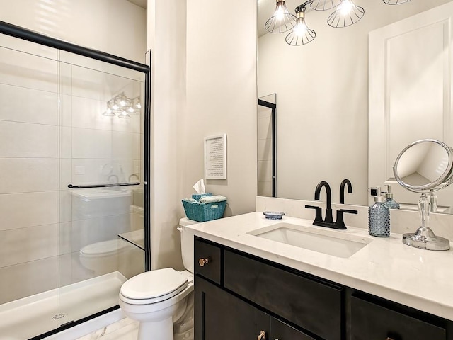 8013 Millridge St, Shawnee, KS 66220 - bathroom with vanity, toilet, and a stall shower