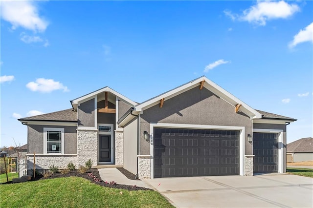 view of front facade with a front lawn and a garage