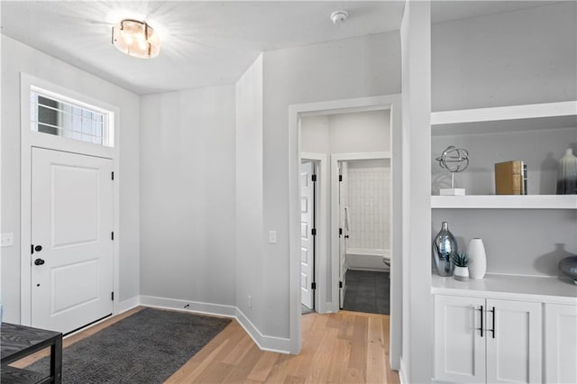 foyer entrance featuring light wood-type flooring