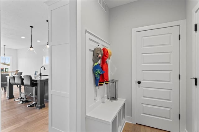 mudroom featuring light hardwood / wood-style floors