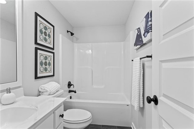 full bathroom with toilet, vanity, tile patterned flooring, and shower / washtub combination