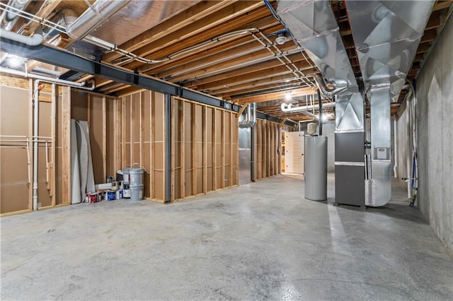 basement with gas water heater and heating unit