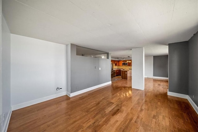 empty room with light wood-type flooring