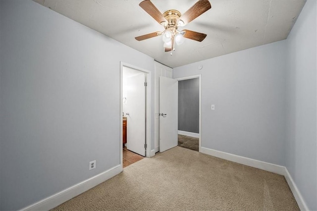 unfurnished bedroom with light carpet and ceiling fan