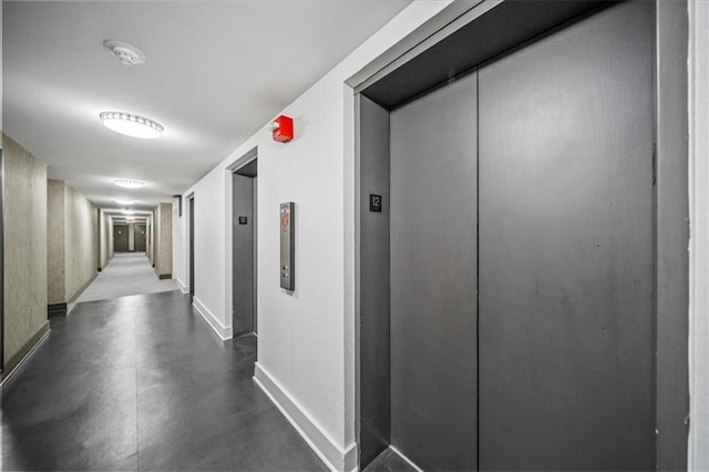 hallway featuring elevator