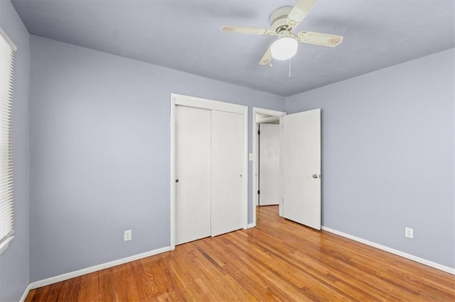 unfurnished bedroom with a closet, ceiling fan, and light hardwood / wood-style floors