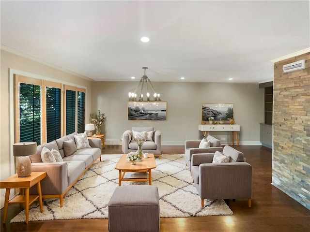 living room featuring ornamental molding, hardwood / wood-style floors, and a chandelier