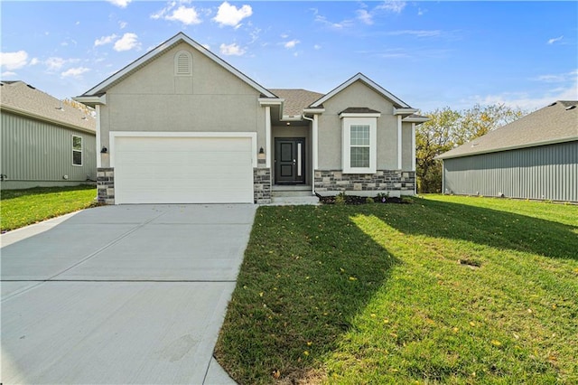 view of front facade with a front yard and a garage