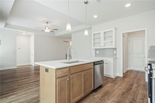 27017 E Olive Dr, Lees Summit, MO 64086 - kitchen featuring stainless steel dishwasher, a sink, tasteful backsplash, dark wood-style flooring, and recessed lighting