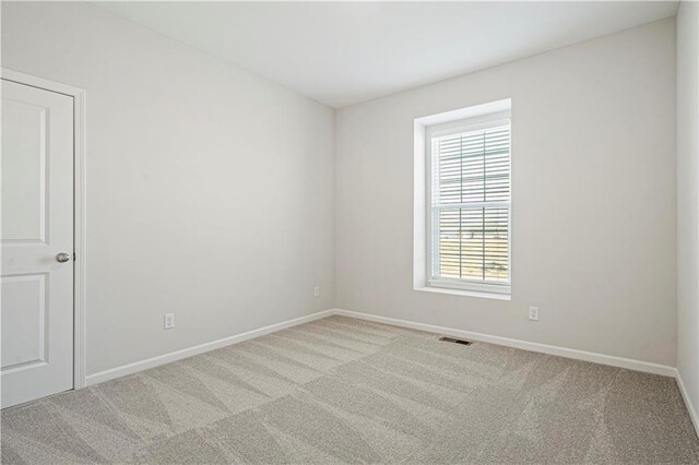 27017 E Olive Dr, Lees Summit, MO 64086 - carpeted empty room with baseboards